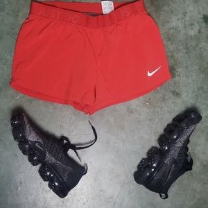 Nike red running shorts